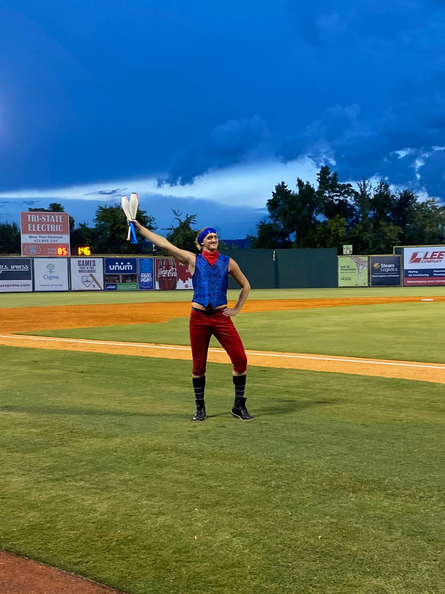 Juggler performing Chattanooga Lookouts baseball show in July 4th theme costume