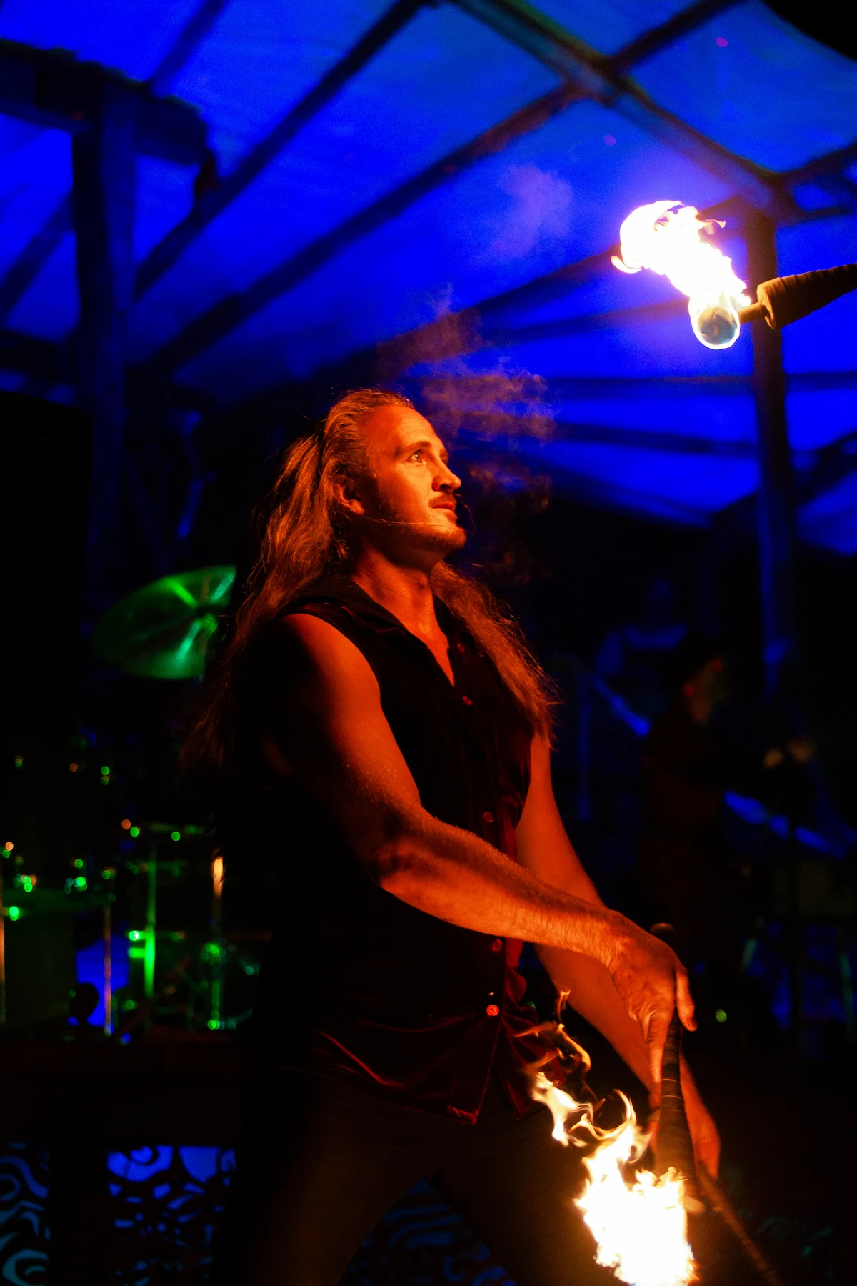 Juggler performing with fire at a festival