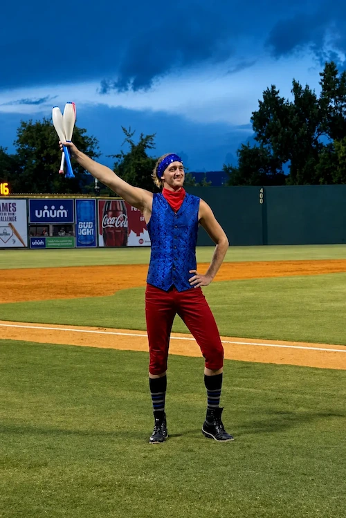 Juggler performing Chattanooga Lookouts baseball show in July 4th theme costume